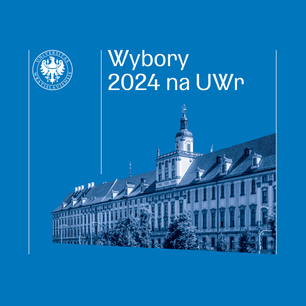 gmach dużego budynku z wieżą na niebieskim tle